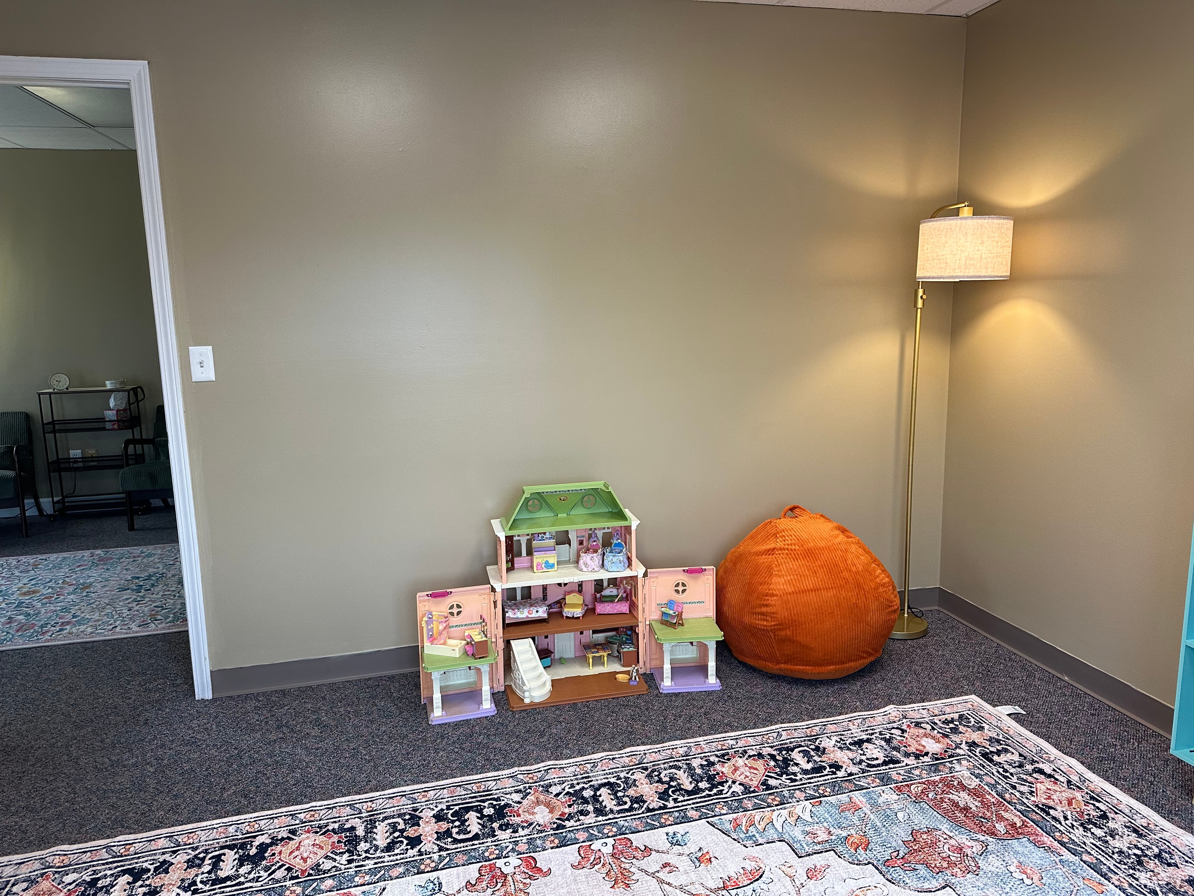 Children playing in a supportive therapy environment